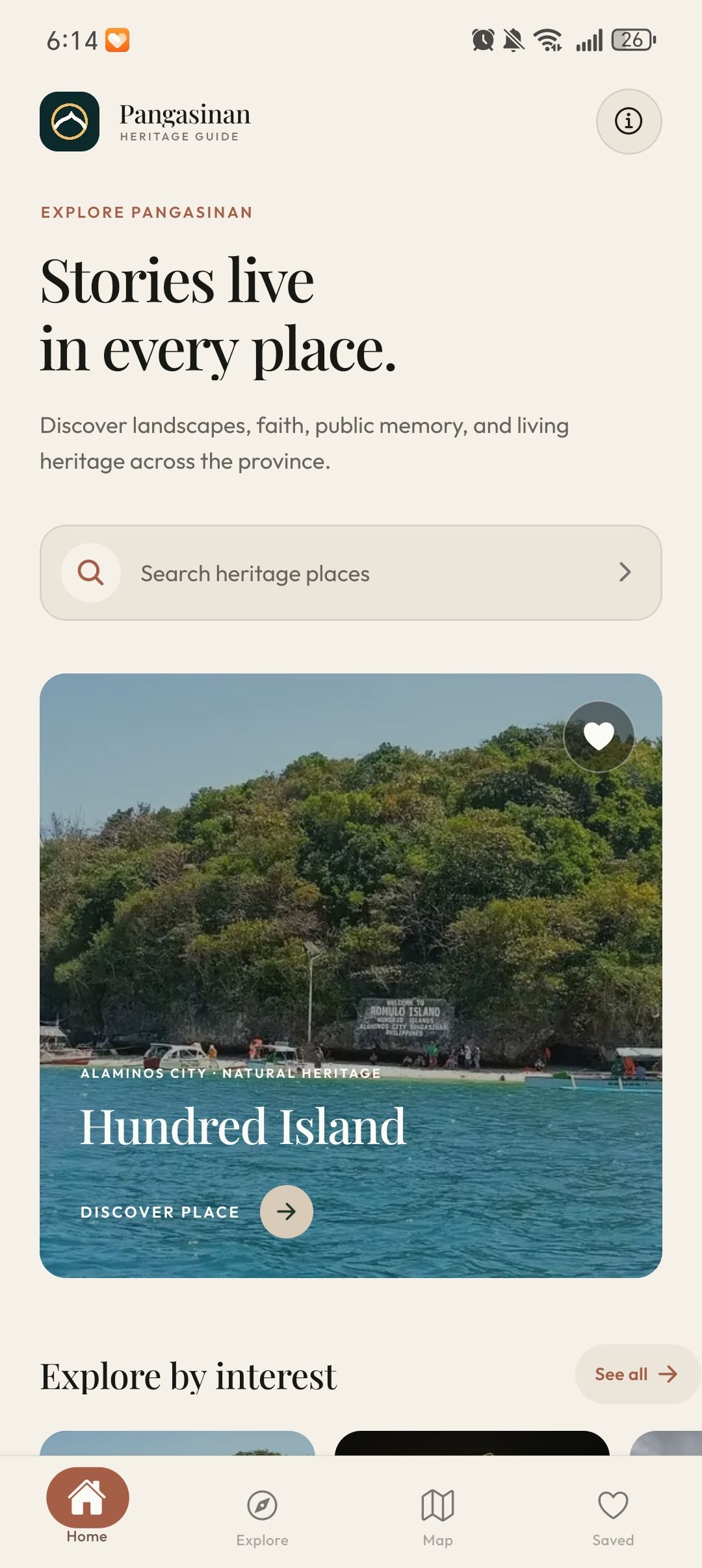 Heritage Guide home screen with a search entry, Hundred Islands feature, and Home, Explore, Map, and Saved navigation.